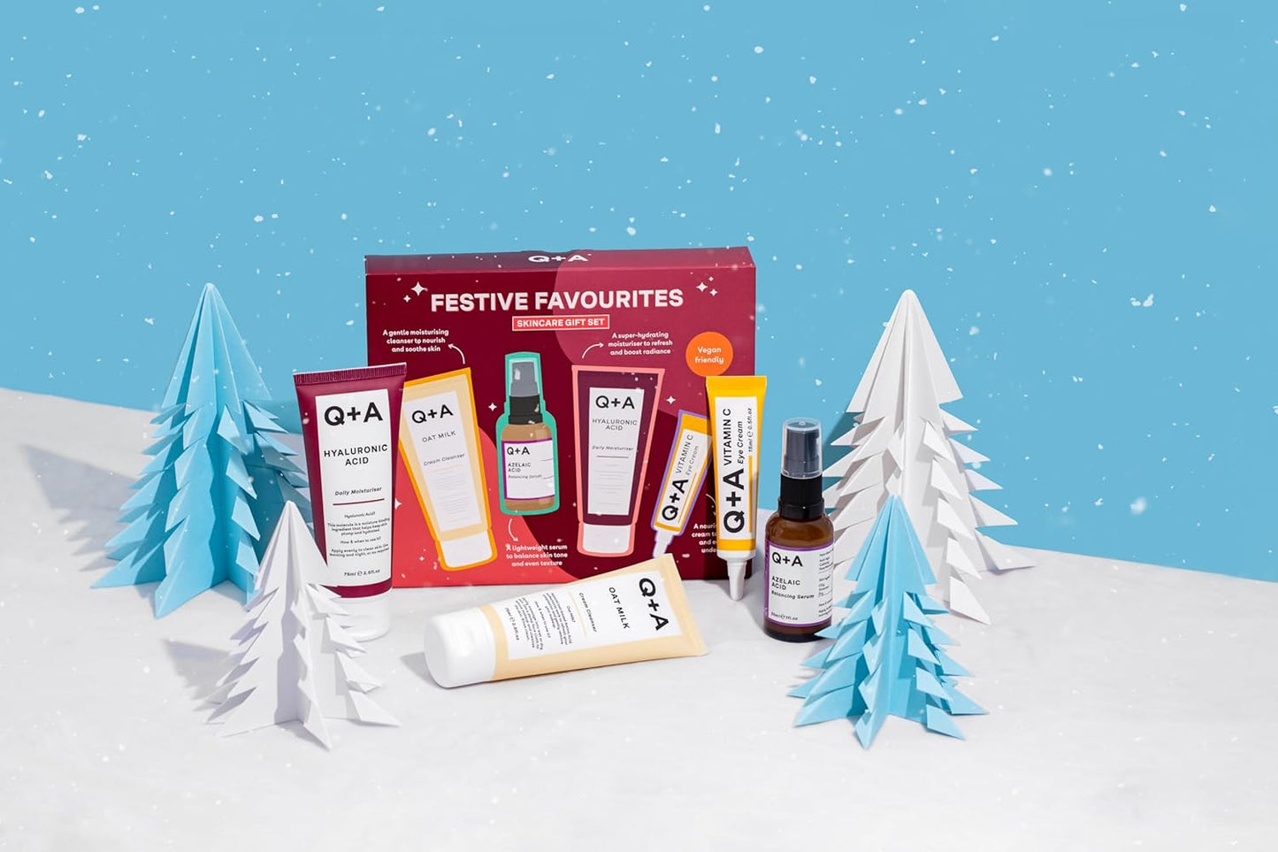 Q+A Festive Favourites Gift Set, containing a Hyaluronic Acid Moisturiser (75ml), an Oat Milk Cream Cleanser (75ml), an Azelaic Acid Serum (30ml), and a Caffeine Eye Serum (15ml)